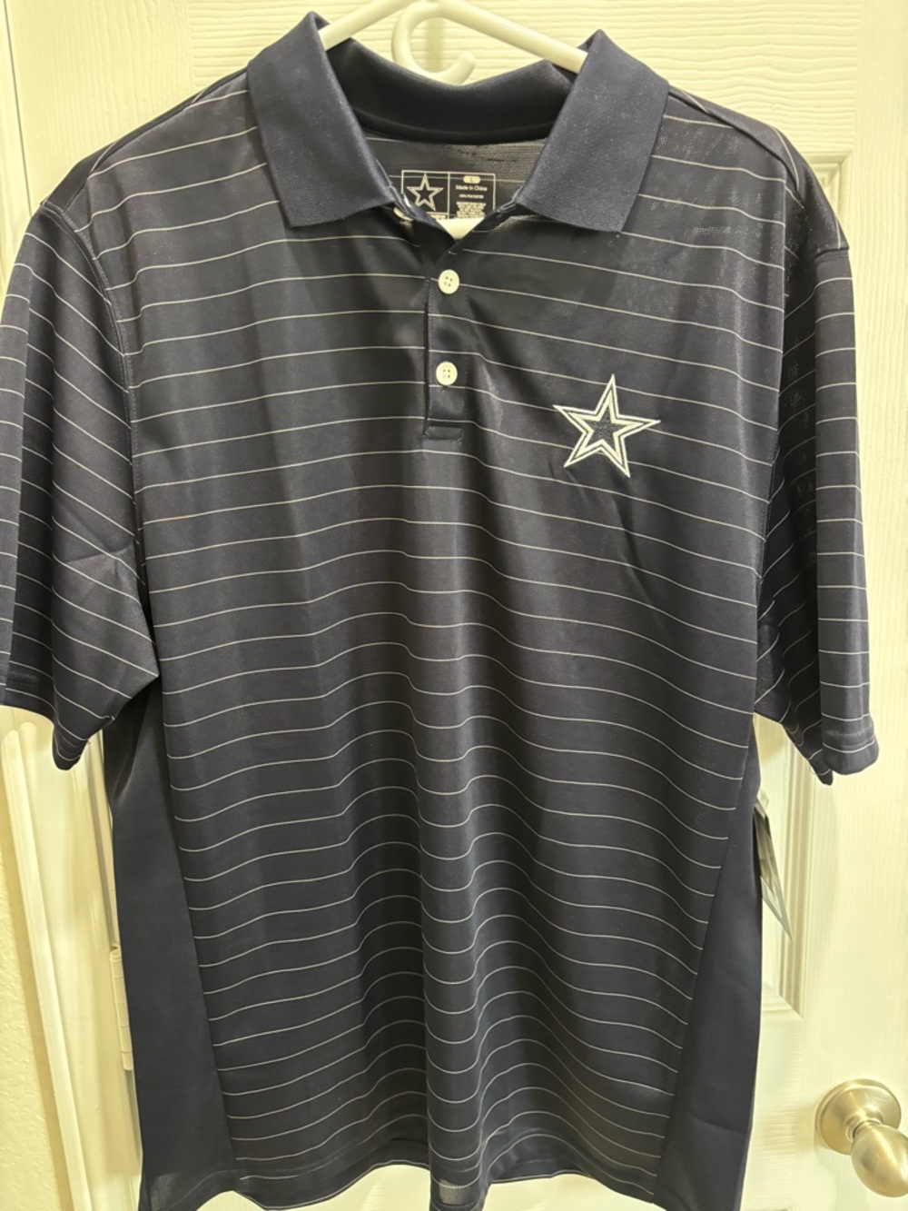 Dallas Cowboys Team Apparel Navy Polo with White Pinstripes and Star Patch
